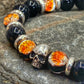 Bracelet FIREBALL Perles 10mm Onyx et argent 925. Motif SKULL