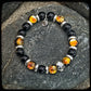 Bracelet FIREBALL Perles 10mm onyx et argent 925. Motif SKULL