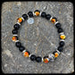 Bracelet FIREBALL Perles 10mm Onyx et argent 925. Motif SKULL