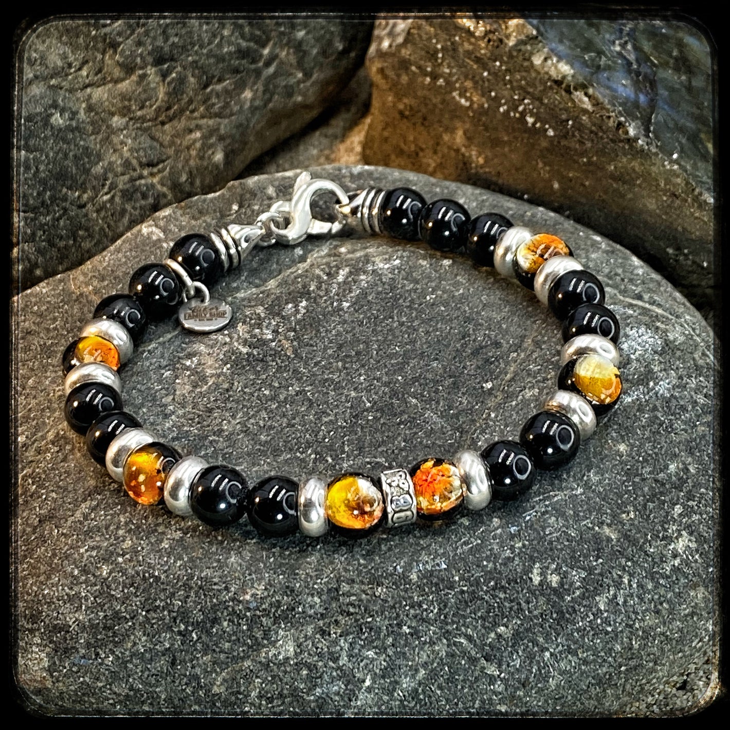 Bracelet FIREBALL Perles 8mm onyx noir Fermoir argent 925. Motif DONUT