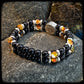 Bracelet FIREBALL Perles 8mm onyx noir et argent 925. Motif DONUT