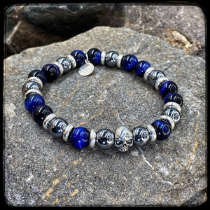 LAGUNA BEACH Unisex Bracelet – 10 mm Blue Tiger Eye & Terahertz Beads – 925 Silver Skull Pattern BFS