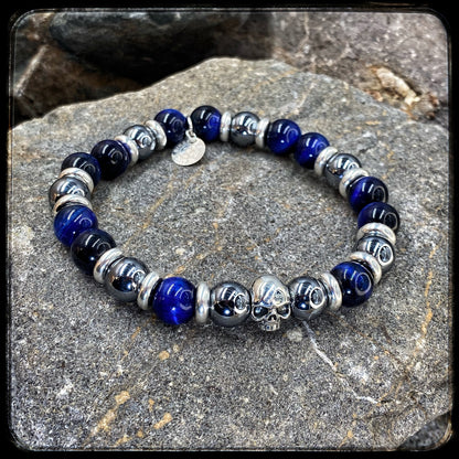 Bracelet LAGUNA BEACH Perles 10mm œil de tigre bleu et térahertz, argent 925. Motif SKULL