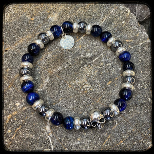 LAGUNA BEACH Unisex Bracelet – 8mm Blue Tiger Eye & Terahertz Beads – 925 Silver Skull Pattern