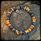 Bracelet MAGMA Perles 10mm larvikite et argent 925. Motif DONUT