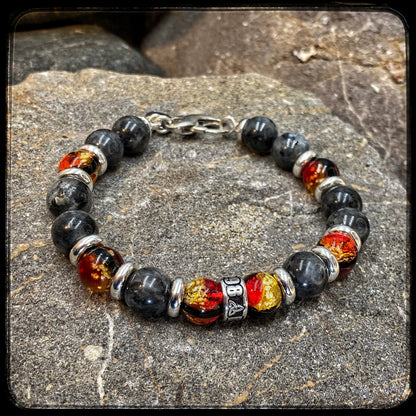 Bracelet MAGMA Perles 10mm larvikite. Fermoir argent 925. Motif DONUT