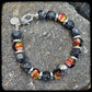 MAGMA Bracelet with 10mm larvikite beads. 925 silver clasp. SKULL motif.