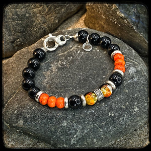 Bracelet MILWAUKEE Perles 10mm onyx noir et magnésite Fermoir argent 925. Motif DONUT