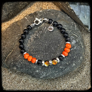 Bracelet MILWAUKEE Perles 8mm onyx noir et magnésite Fermoir argent 925. Motif DONUT