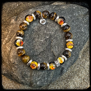 Bracelet TENNESSEE Perles 10mm œil de tigre jaune et argent 925. Motif DONUT