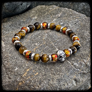 Bracelet TENNESSEE Perles 8mm.Œil de tigre jaune et argent 925. Motif SKULL