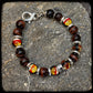 TEXAS Bracelet 10mm bull's eye beads. 925 silver clasp. DONUT motif