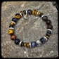 TOBACCO Bracelet Multipearls 10mm and 925 silver. SKULL pattern