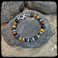 Bracelet TOBACCO Multiperles 10mm. Fermoir argent 925. Motif DONUT
